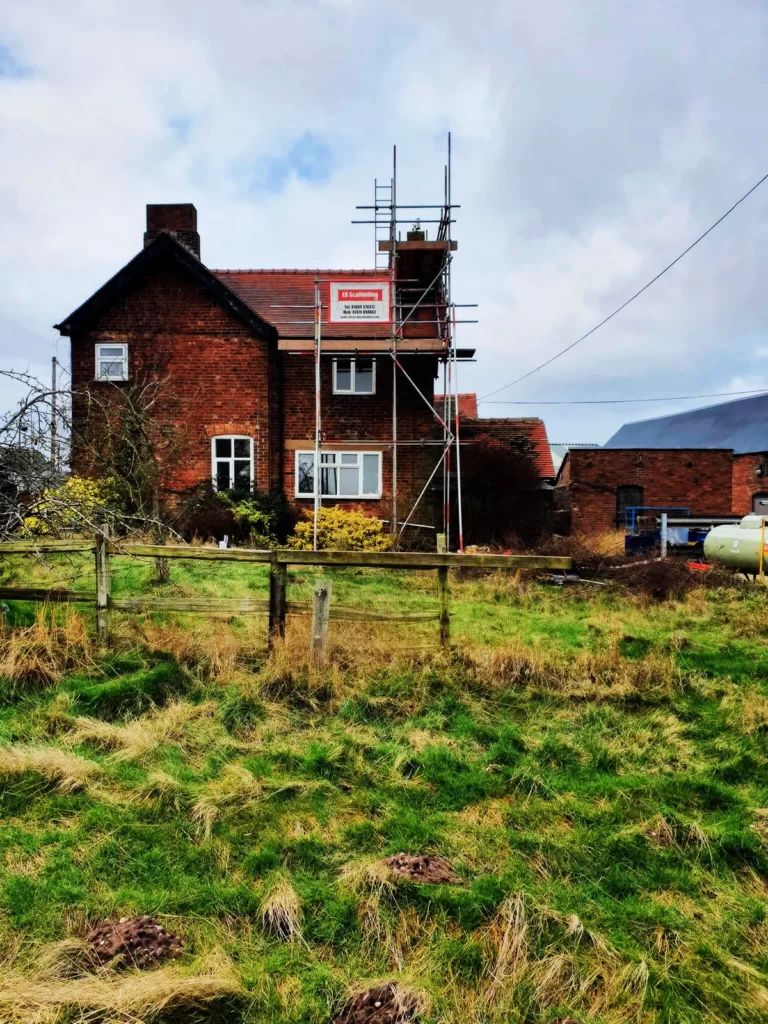 Chimney scaffold on a red brick house