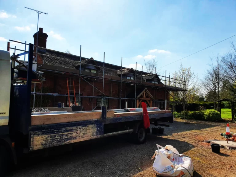 EB Scaffolding lorry delivering scaffolding to a site